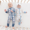 Two babies, one in baseball romper and one in american flag with blue bows romper