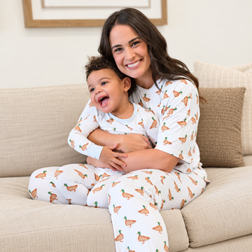 mom and child in duck pajamas 