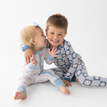 Kids in baseball and American flag pjs 